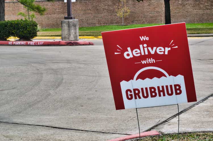 Grubhub sign posted in the ground in Humble, Texas.