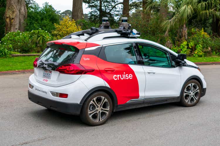 Self-driving Chevrolet Bolt by Cruise Automation undergoing testing in San Francisco. The vehicle is equipped with numerous Velodyne LiDAR sensors