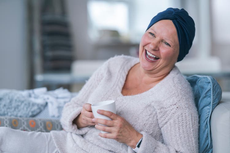 Woman with cancer laughing