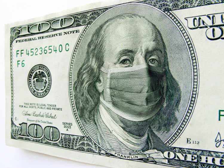 Ben Franklin wearing a Coronavirus Healthcare Mask on One Hundred Dollar Bill.