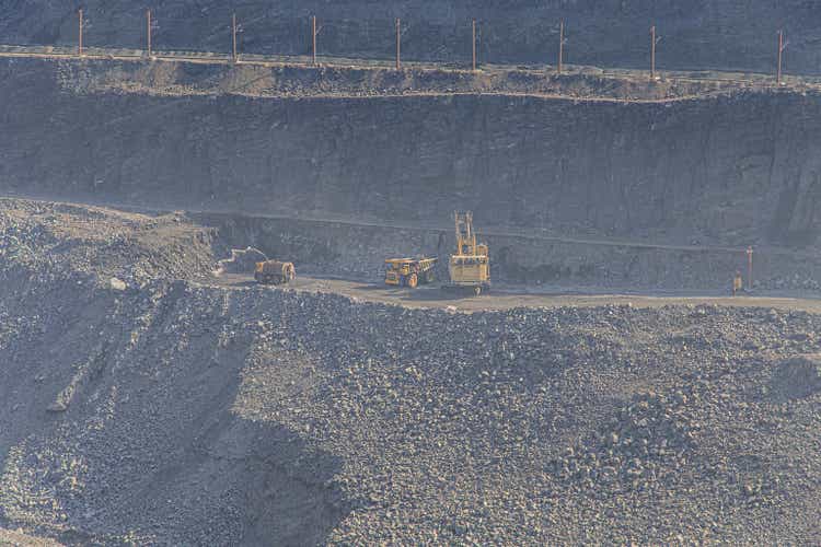 Panorama of iron ore quarry on a sunny day