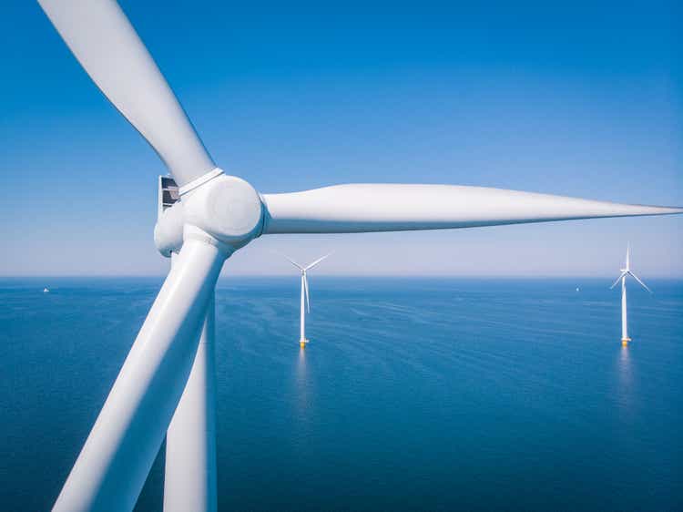 Wind turbine from aerial view, drone view at Westereerdijk wind farm, a wind farm in the IJsselmeer, the largest in the Netherlands, sustainable development, renewable energy