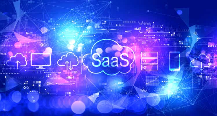 SaaS - software as a service concept with technology light background