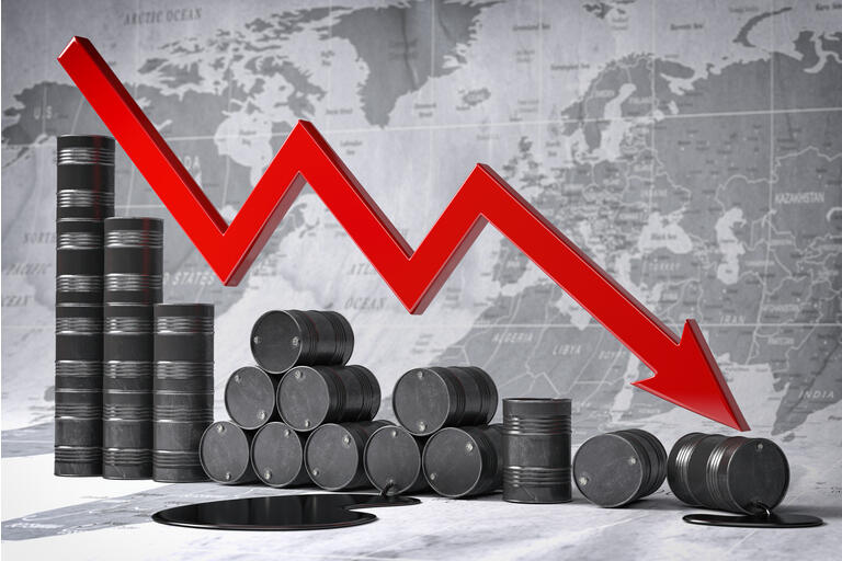 Crisis in oil and petroleum ndustry. Oil barrels and falling graph on world map background. Oil price or production decrease concept. 3d illustration