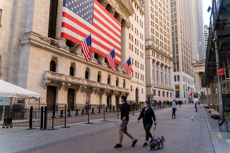 Economic recession is coming. ‘Fearless Girl’ Statue in front of the Stock Exchange from the Wall Street deserted because of the COVID-19 pandemic.