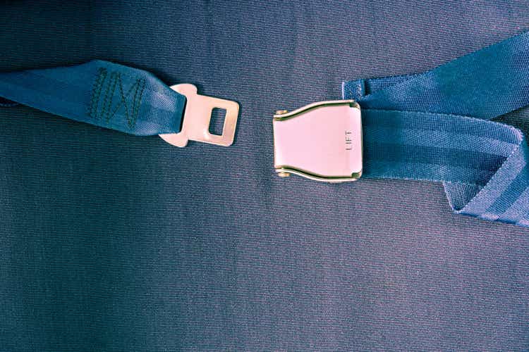 Airplane safety seatbelt closeup with copy space