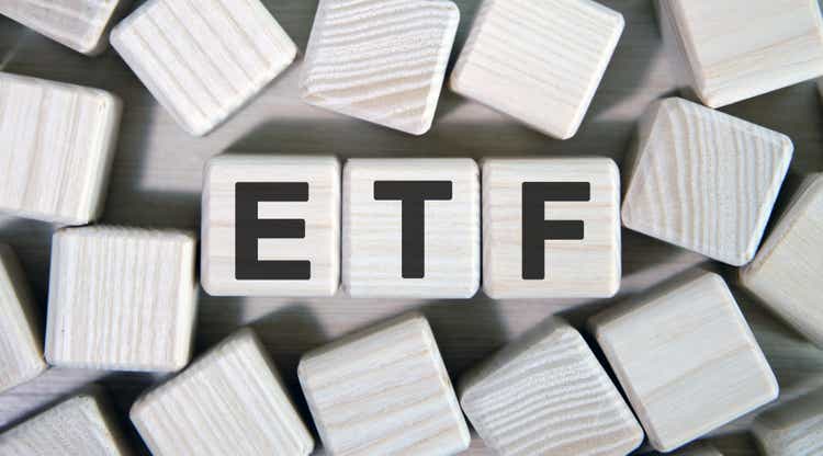 ETF text on wooden square cubes surrounded by other cubes