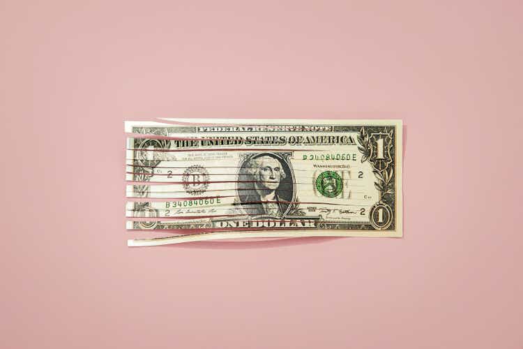 Shredded one dollar bill