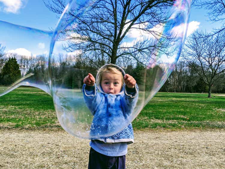 Boy Popping Bubble