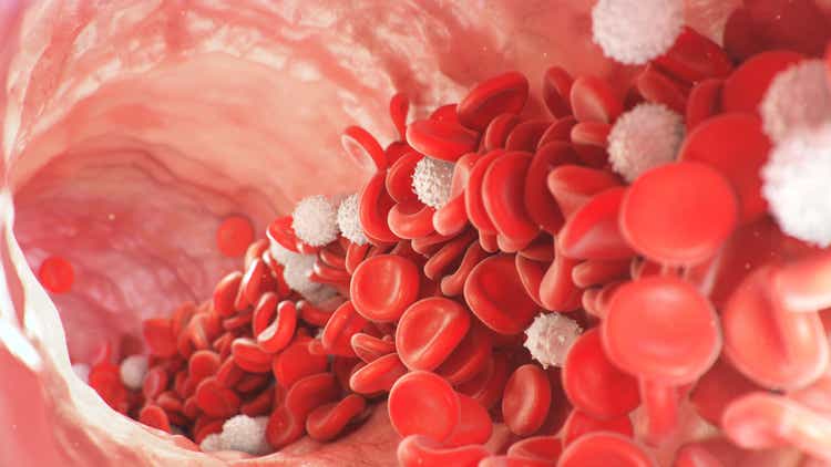 Red and white blood cells move inside the artery. Red blood cells carry nutrients for the whole body, for example, oxygen. Medical science illustration