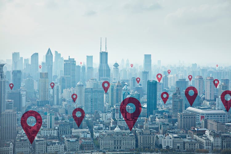 Map pin icons on cityscape of Shanghai