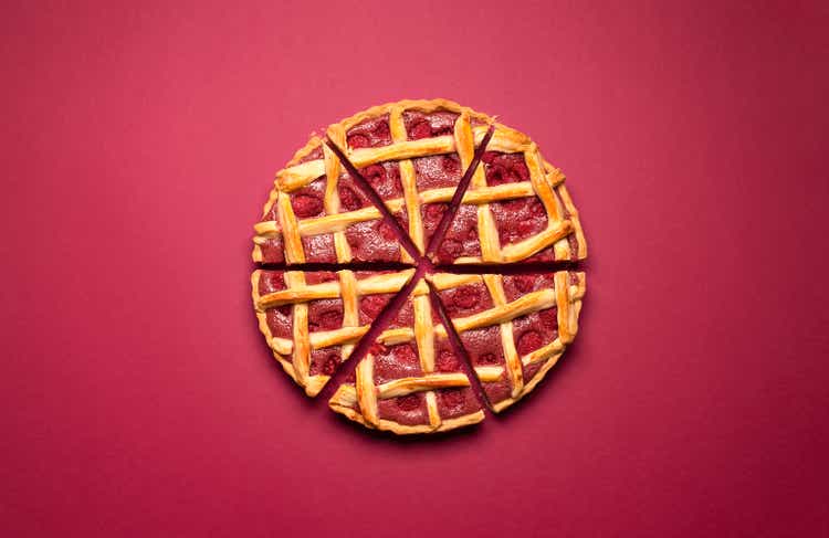 Sliced raspberry pie with a lattice crust. Tasty classic dessert