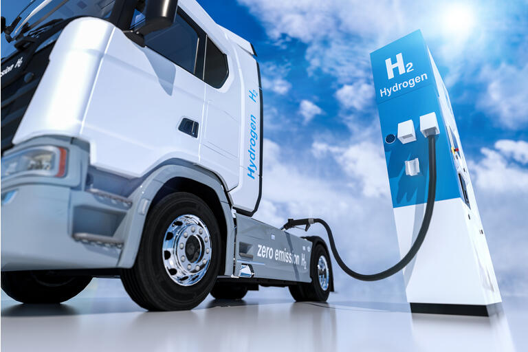 hydrogen logo on gas stations fuel dispenser. h2 combustion Truck engine for emission free ecofriendly transport