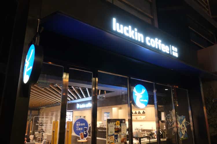 exterior of Luckin coffee shop at dark night