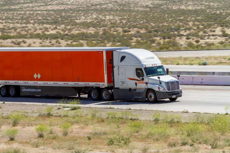 Schneider National semi-truck with trailer traveling south on Interstate 15