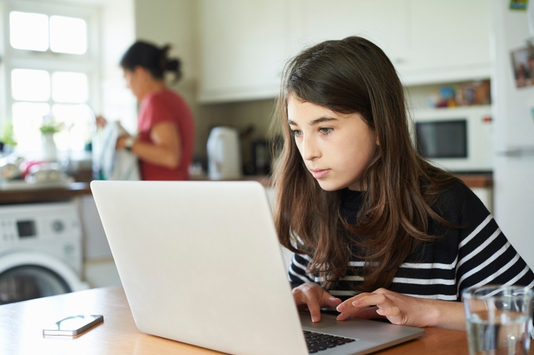 Young girl home schooling