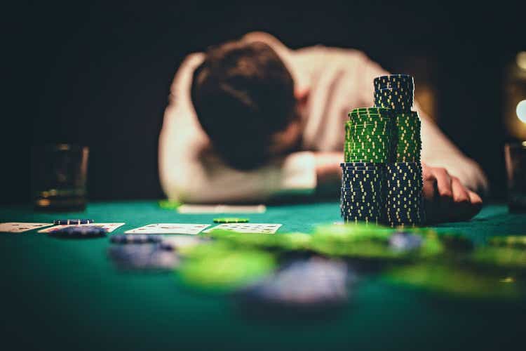 Man losing in poker game
