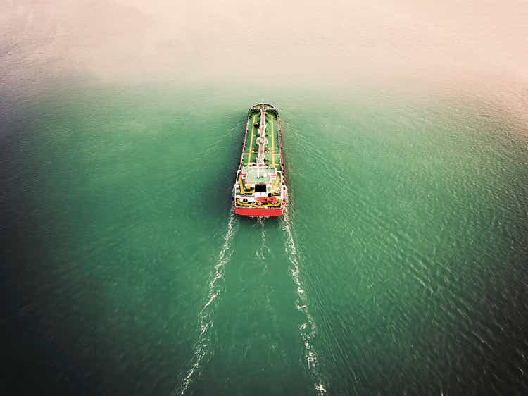 Aerial view Oil ship tanker carier oil from refinery on the sea.