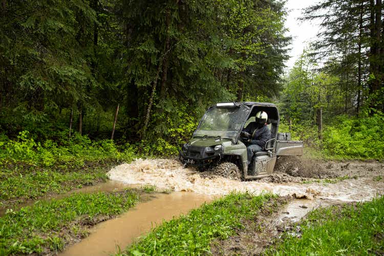 Off roading UTV in wet environment.