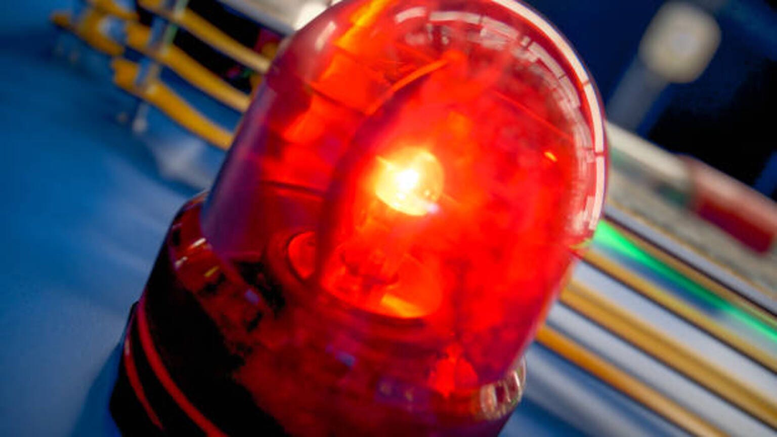 Closeup image of red alarm lights on building wall