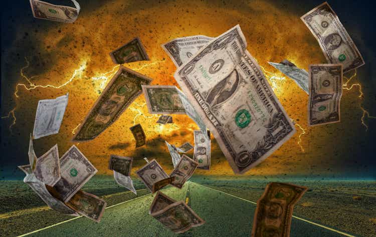 storm of banknotes symolizes the monetary system
