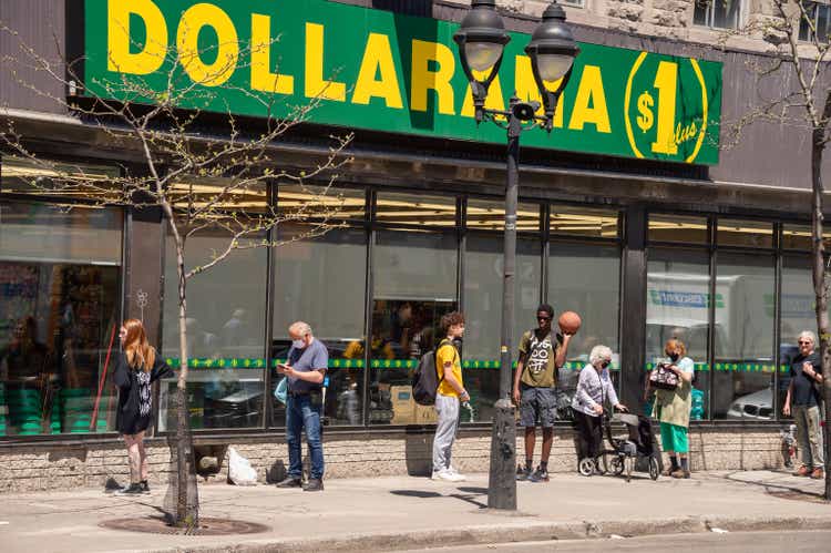 People in line at Dollarama store during Coronavirus pandemic on Mont-Royal Avenue.
