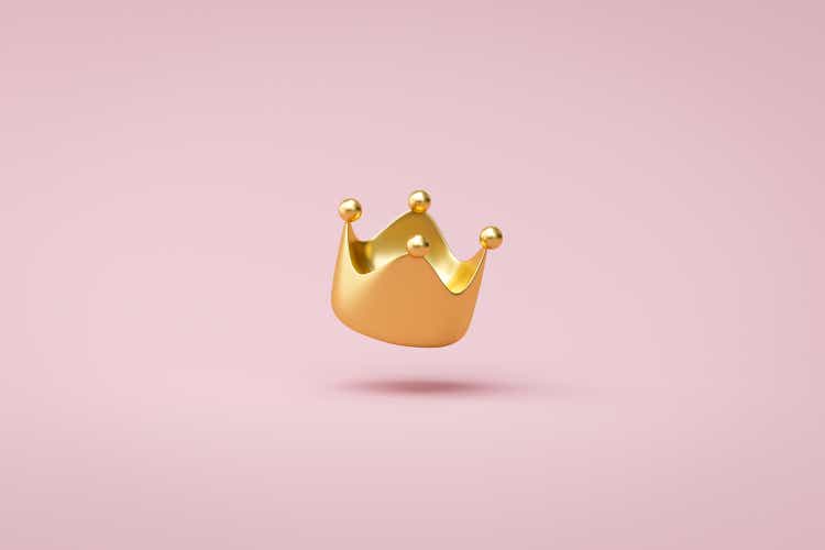 Gold crown on pink background with victory or success concept. Luxury prince crown for decoration. 3D rendering.