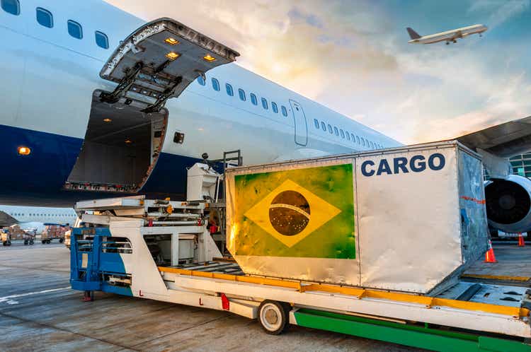 Loading the container in the cargo airplane.