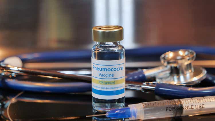 Vial of Pneumococcal vaccine on a stainless steel background