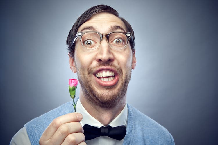 Nerd Student Giving Flower
