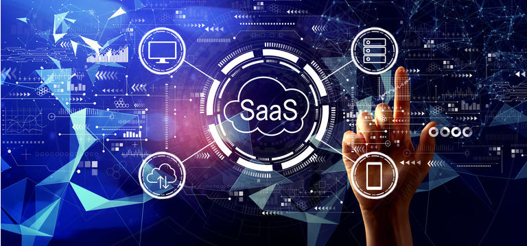 SaaS - software as a service concept with hand pressing a button