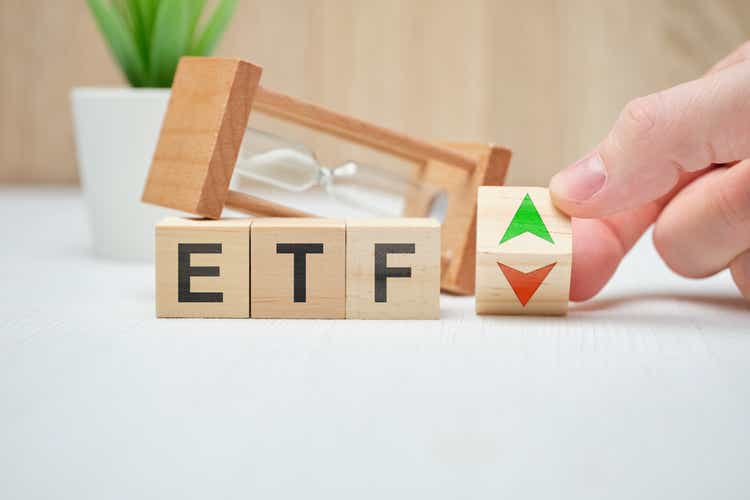 Concept business etf concept on wooden cubes.