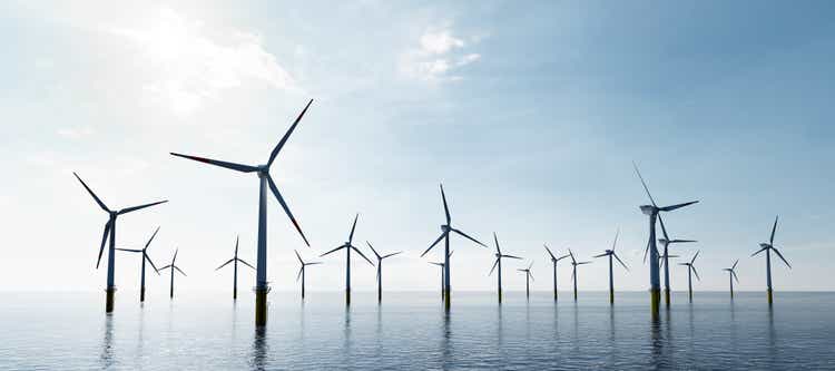 Offshore wind turbines farm on the ocean. Sustainable energy