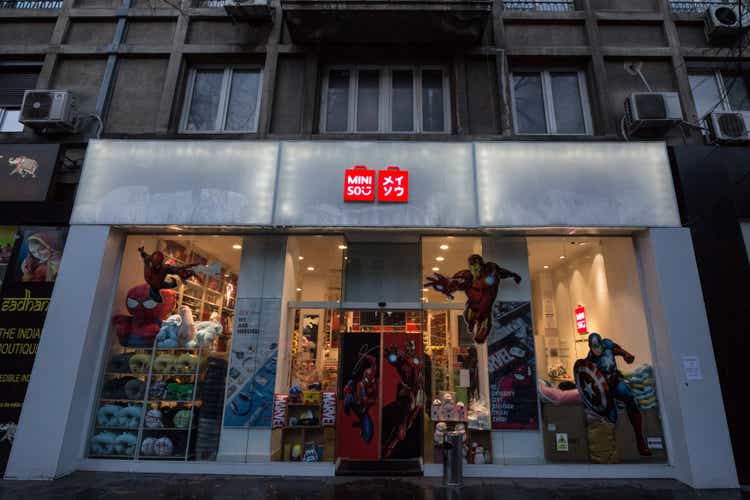 Miniso logo in front of their shop for Bucharest. Miniso, or Mini So is a chinese chain of asian theme low cost variety stores.