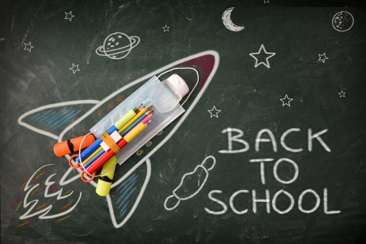 School design on blackboard with tools and covid-19 protection detail