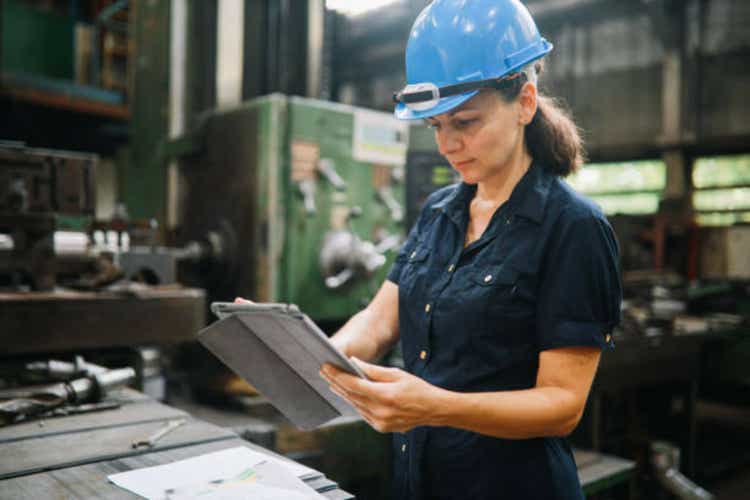 Quality control inspector woman working at the STEM sector