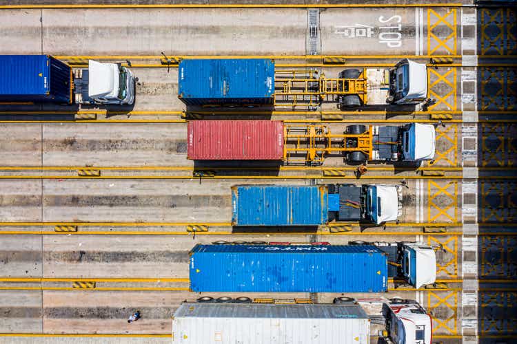 Colorful containers in container terminal, trade Industry Hong Kong China. Top view drone aerial shot.