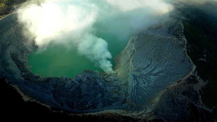 top view inside a volcano which is erupting in the Java island in Indonesia