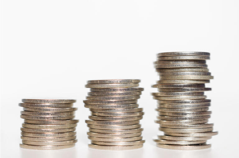 silver coin stack growth up isolated on white background with clipping path. money saving, financial grow, business startup, economy budget and investment concept.