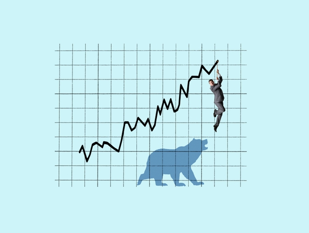 Businessman Hanging On For Dear Life As Stocks Markets Rise
