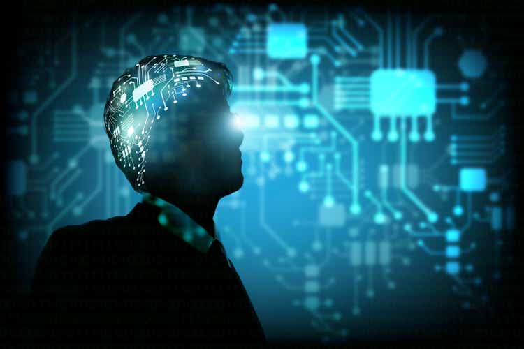 Businessman with neuron ai circuit link with brain, Artificial intellegence futuristic human brain robot concept