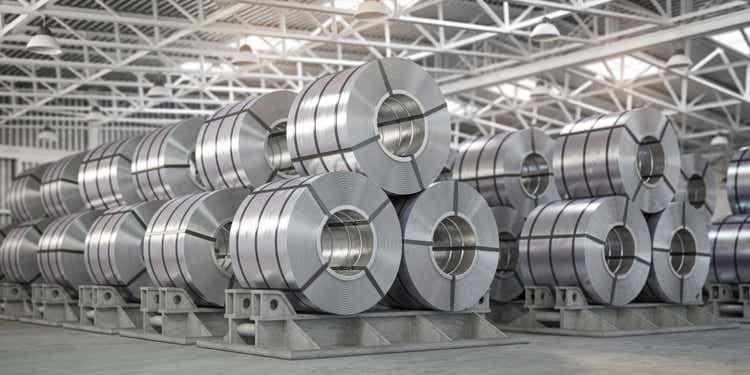 Rolls of metal sheet. Zinc, aluminium or steel sheet rolls on warehouse in factory.
