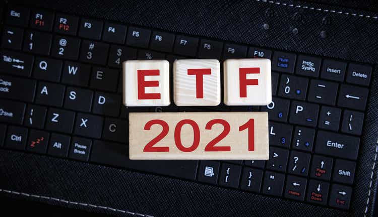 ETF 2021 concept. Wooden cubes on a black keyboard