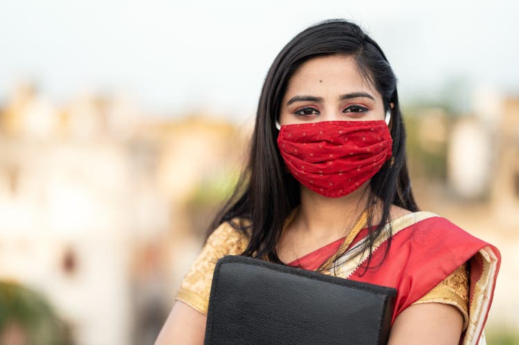Portrait of Young Asian/ Indian Businesswoman in sari
