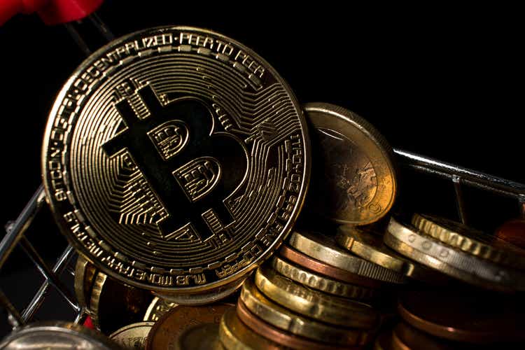 Bitcoin jumps back to over $70K, buoying crypto-tied stocks