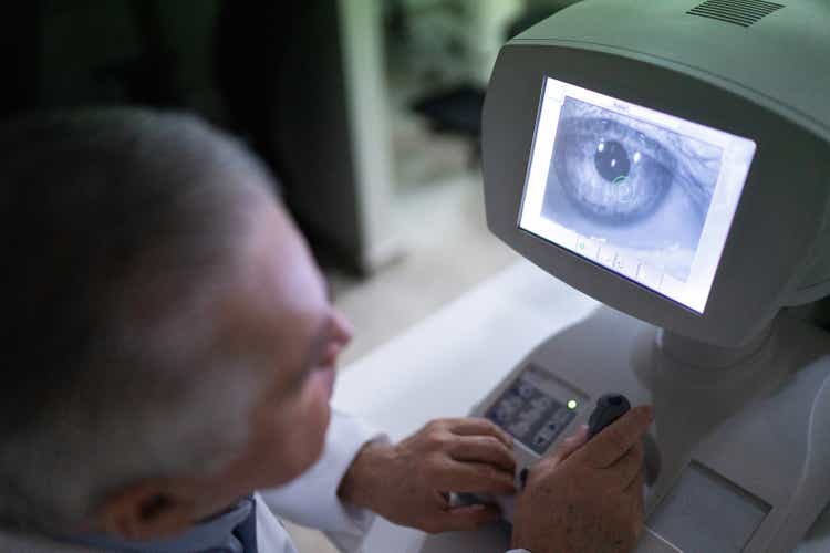 Ophthalmologist analyzing exam