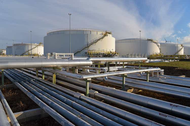 pipeline,storage tanks and buildings of a refinery - industrial plant for fuel production