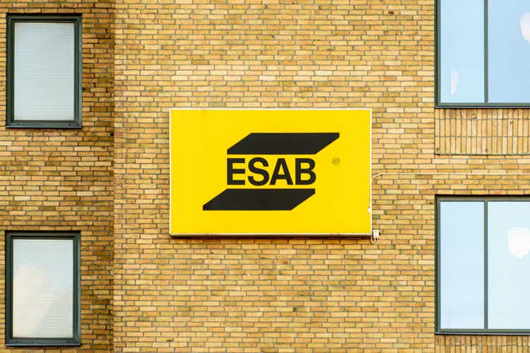 Logo of ESAB company in a brick wall