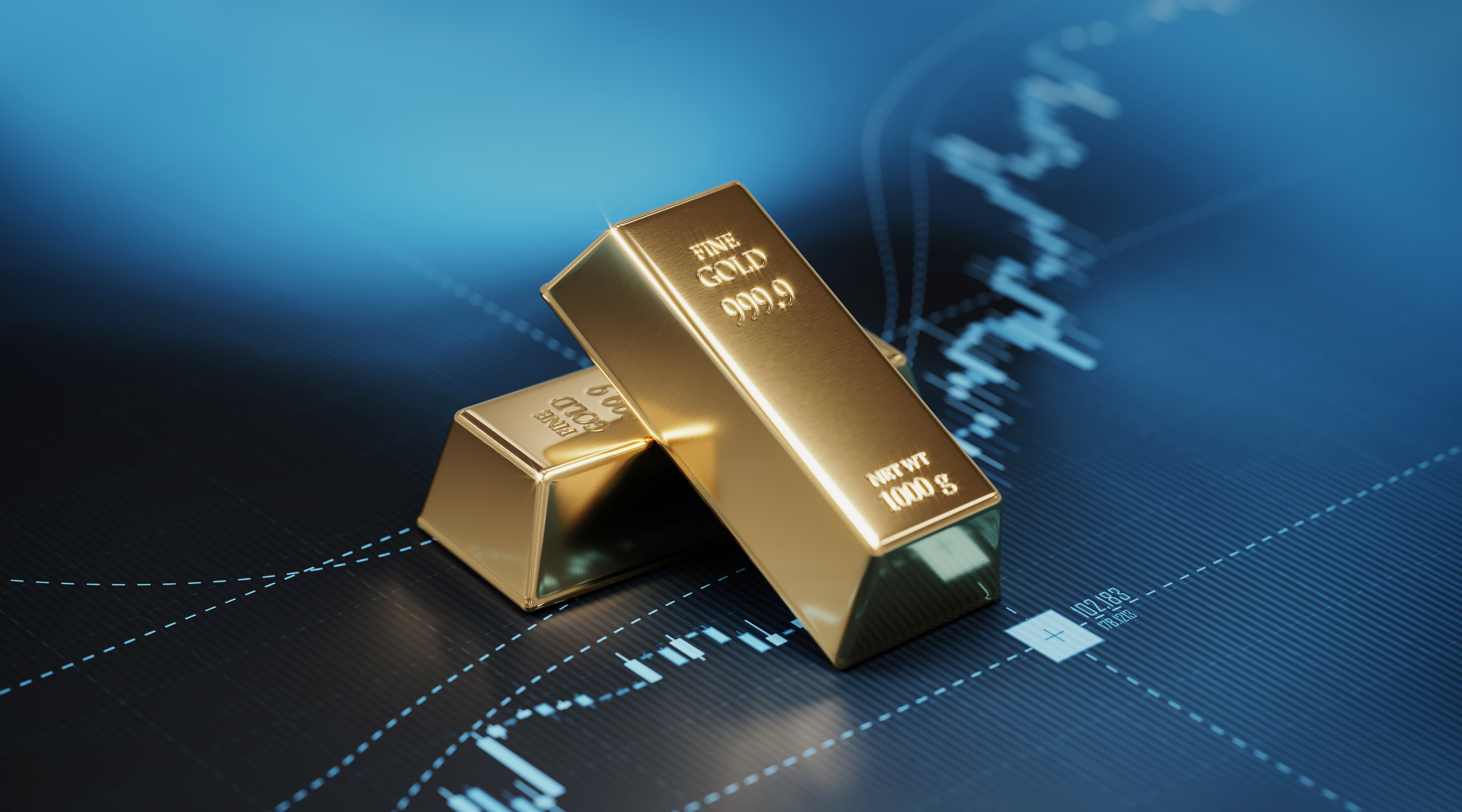 Gold Bars Sitting on Blue Bar Graph - Stock Market and Finance Concept