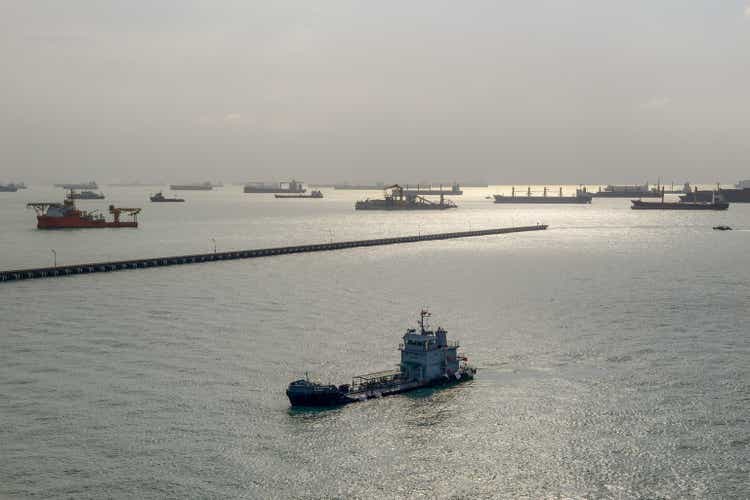 Landscape view of Cargo ships entering one of the busiest ports in the world, Singapore